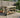 Indoor/outdoor workbench, pressure treated bench with double shelf and wheels